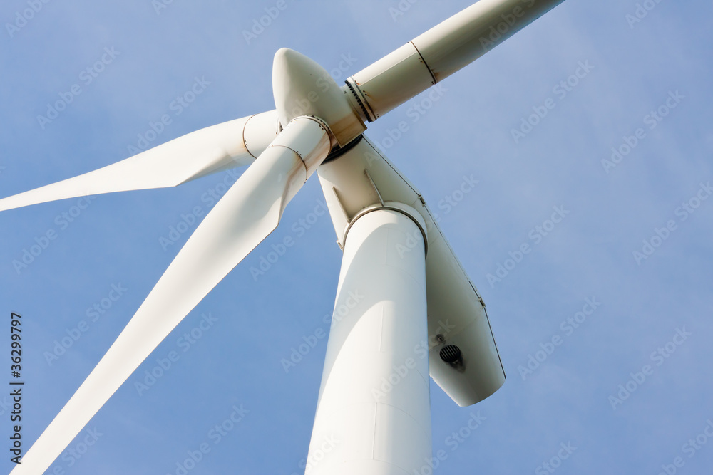 Impressive upward look to a big windturbine Impressive upward look to a big windturbine