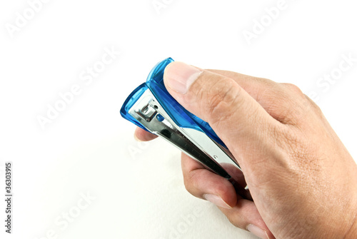 Hand using stapler