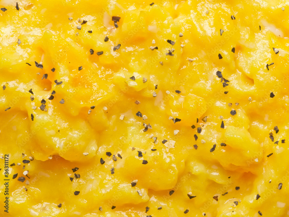close up of scrambled eggs with pepper food background