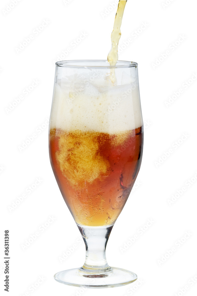 Alcohol dark beer pouring into a glass isolated over white. Alcohol dark beer pouring into a glass isolated over white.
