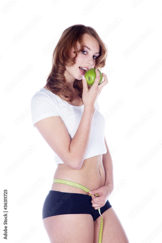 Model Bodykontrolle mit Maßband und Apfel Porträt Model Bodykontrolle mit Maßband und Apfel Porträt