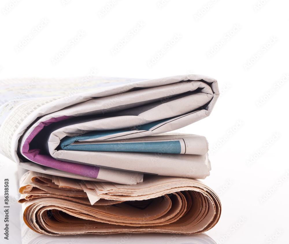Coloful Newspapers on white background with copy space Coloful Newspapers on white background with copy space