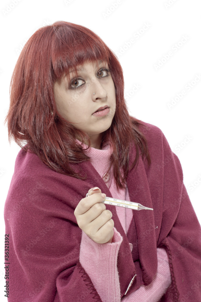 Obraz premium Portrait of sick girl with thermometer
