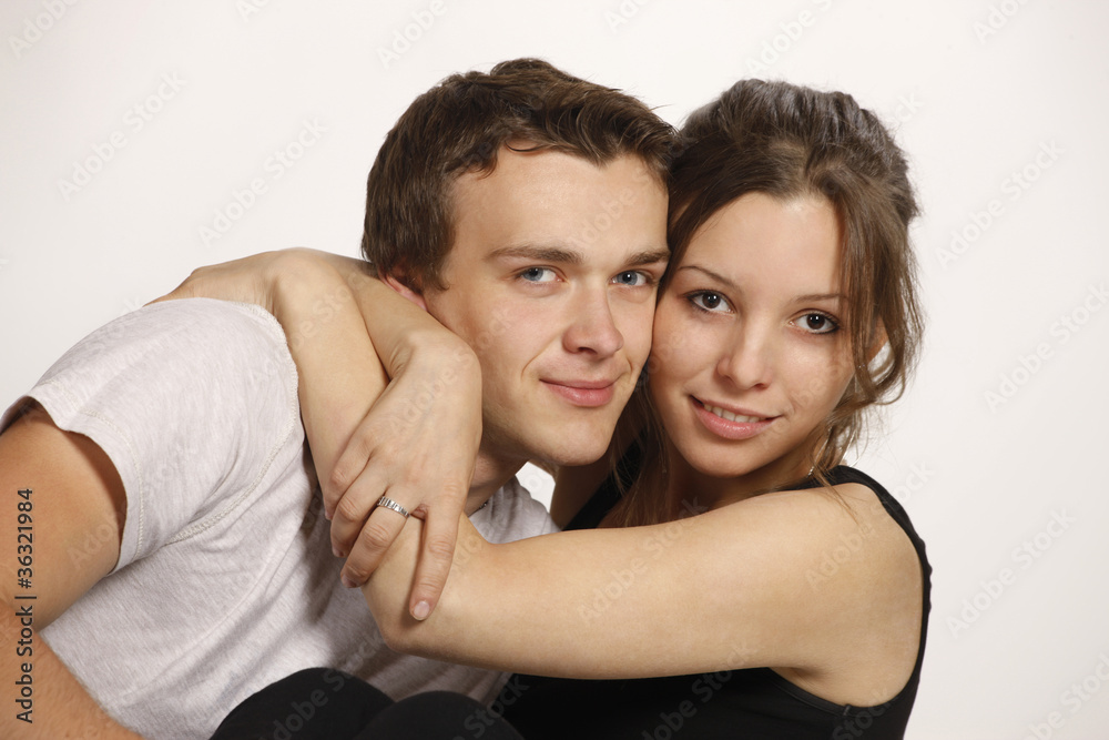 Young couple on white background