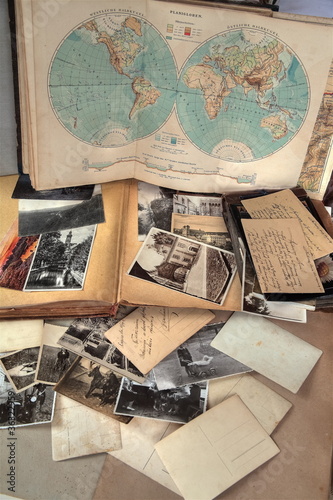 Old books,albums,photos,postcards and letters and atlas.