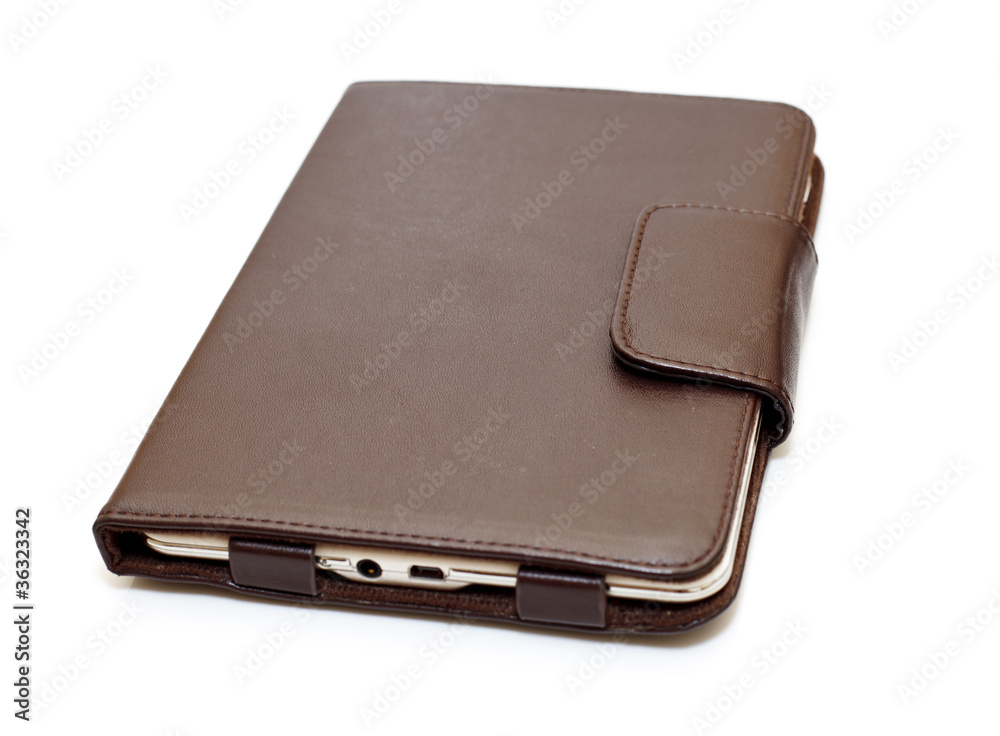 E-book in brown leather closed isolated on white background E-book in brown leather closed isolated on white background
