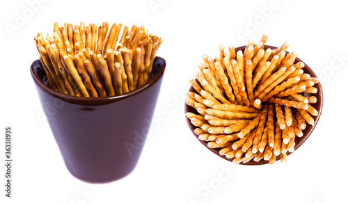 sticks with poppy seeds, salty sticks isolated on white