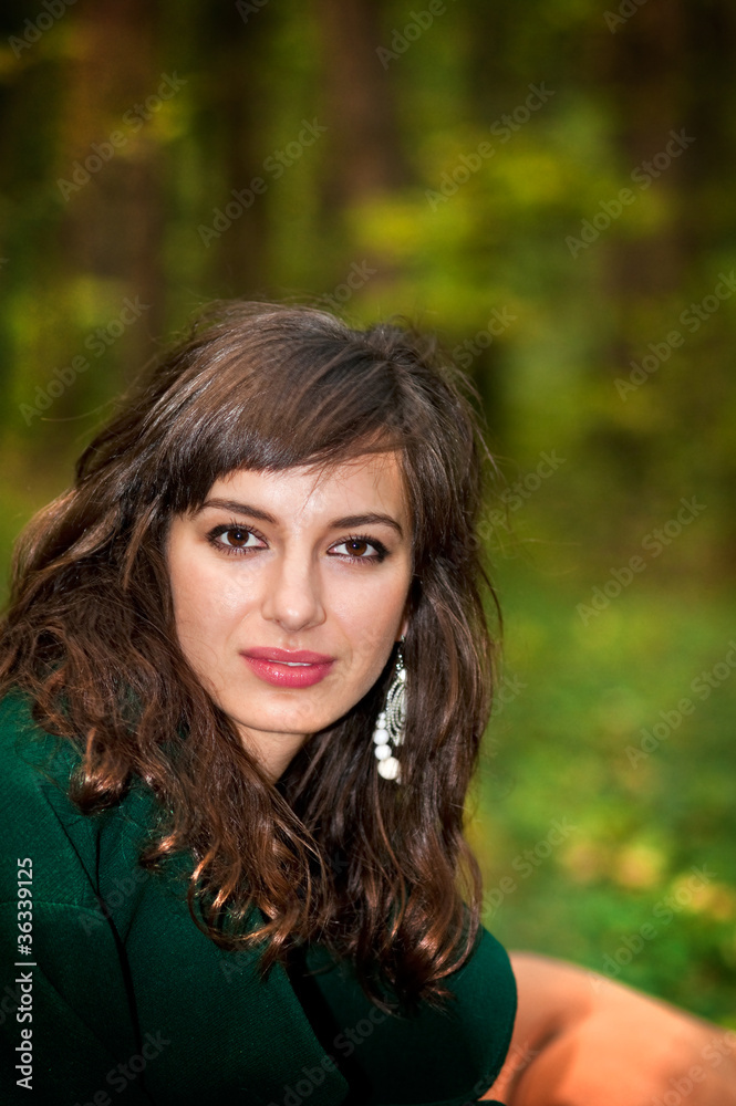 Woman in autumn park