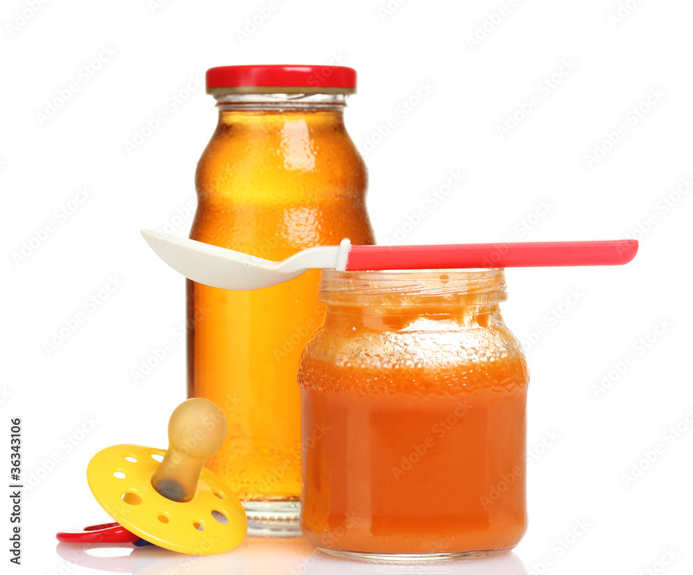 baby food and spoon isolated on white baby food and spoon isolated on white