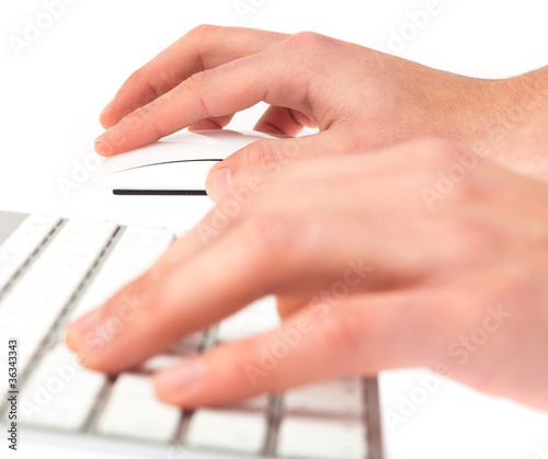 man typing with keyboard