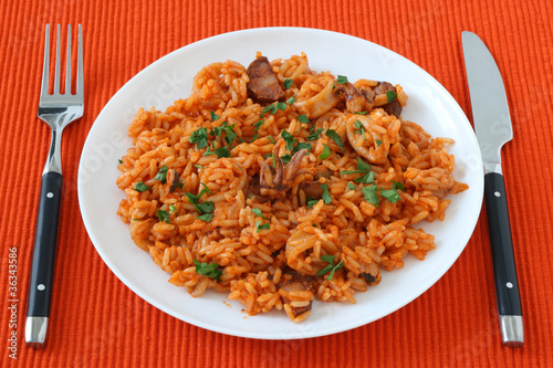 Rice with seafood and sausages
