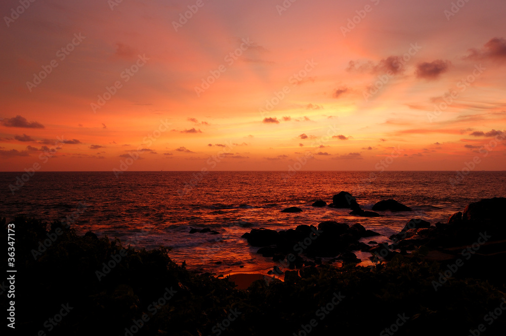 Sunset at the beach of Indian Ocean, Sri Lanka