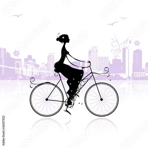 Girl cycling in the city