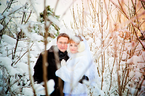 Bride and groom in the winter
