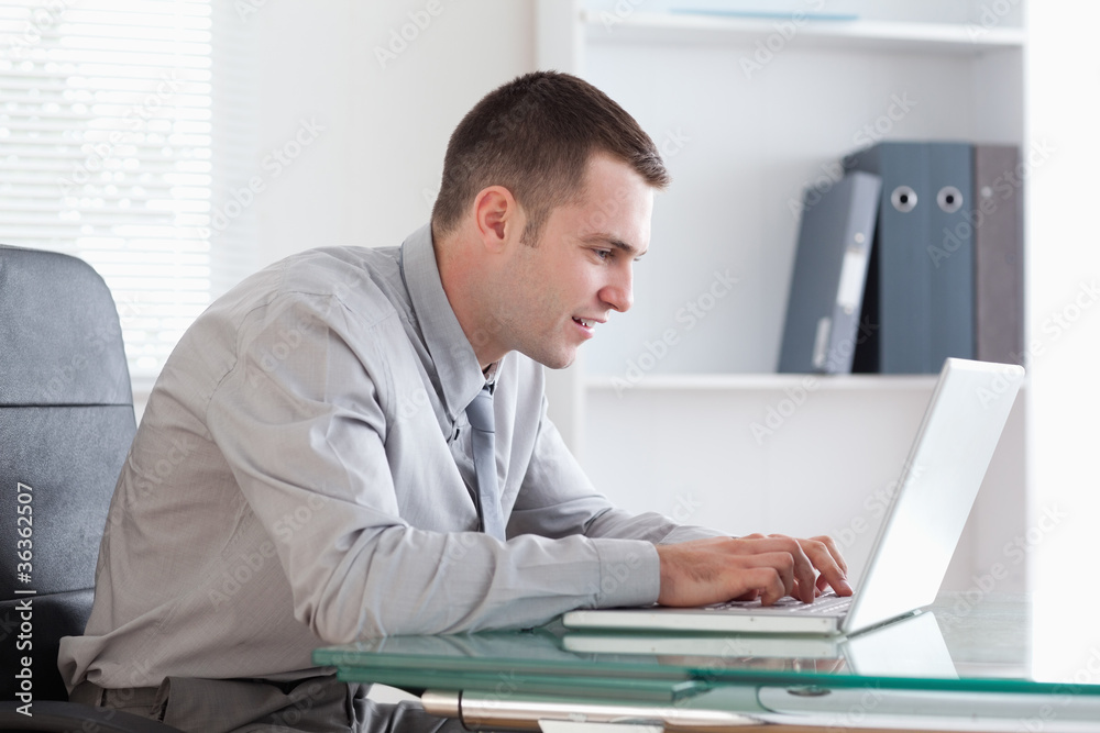 Businessman working concentrated on his laptop Businessman working concentrated on his laptop
