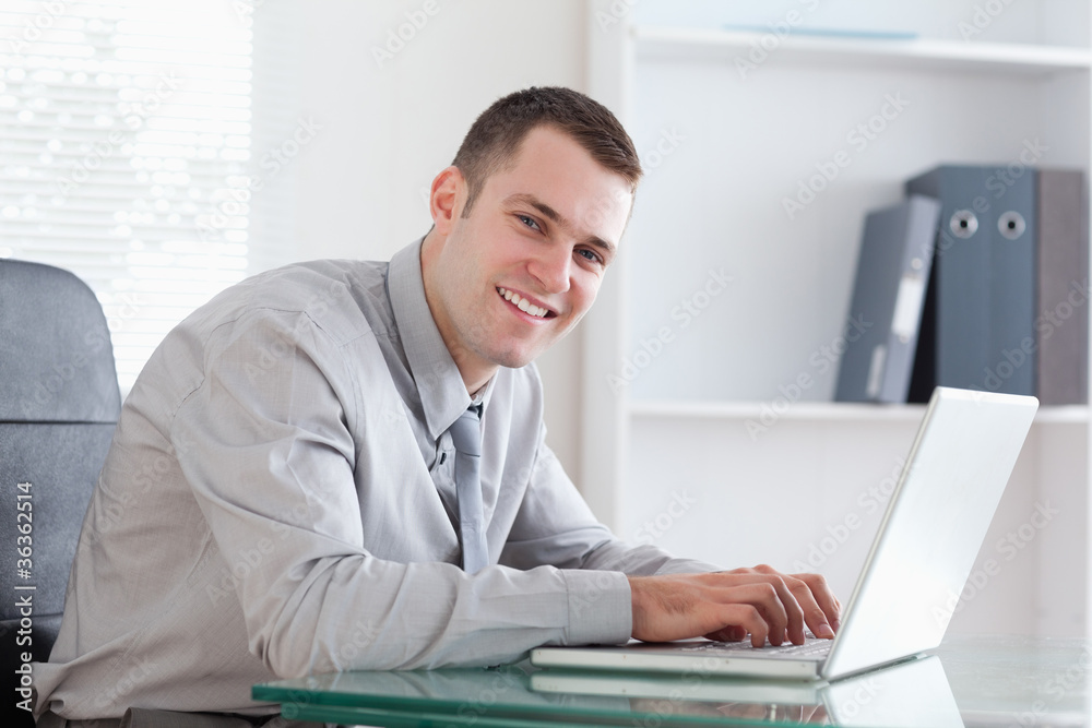 Businessman typing on his laptop Businessman typing on his laptop