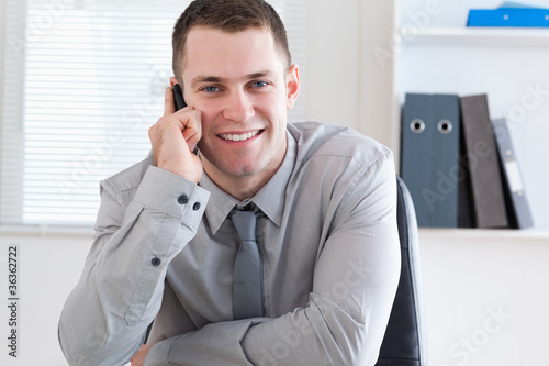 Businessman using his mobilephone