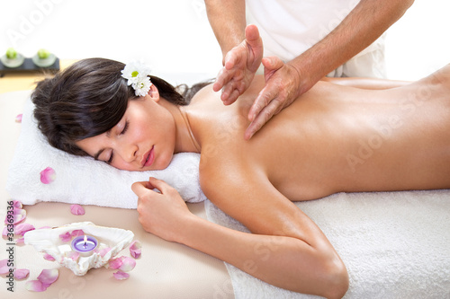 Fresh and Beautiful brunette woman having massage