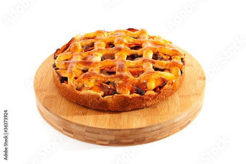 Delicious home baked apple pie over white background