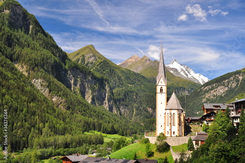Heiligenblut church in front of Grossglockner peak, Austria