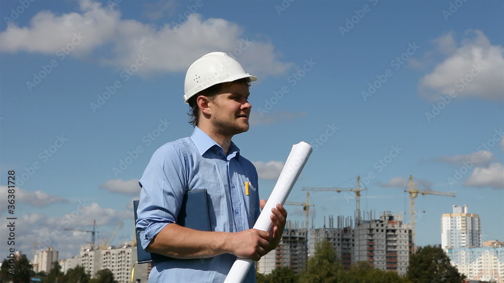 builder inspects the site of the future construction site builder inspects the site of the future construction site
