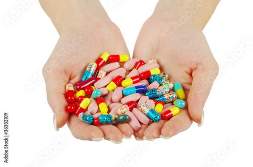 hands holds pills