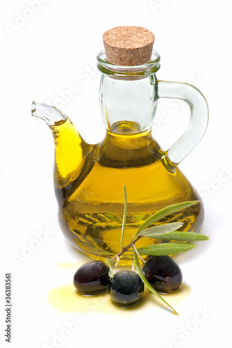 bottle of olive oil and fresh olives