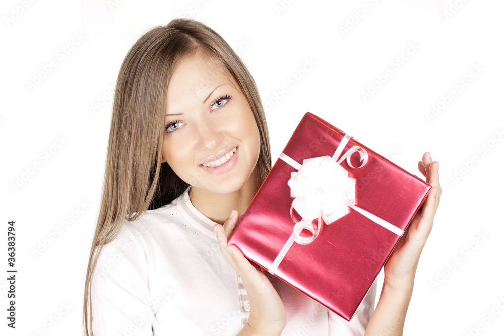 beautiful young smiling woman holding christmas gift beautiful young smiling woman holding christmas gift