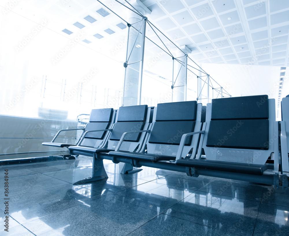 Fototapeta premium contemporary blue lounge with seats in the airport