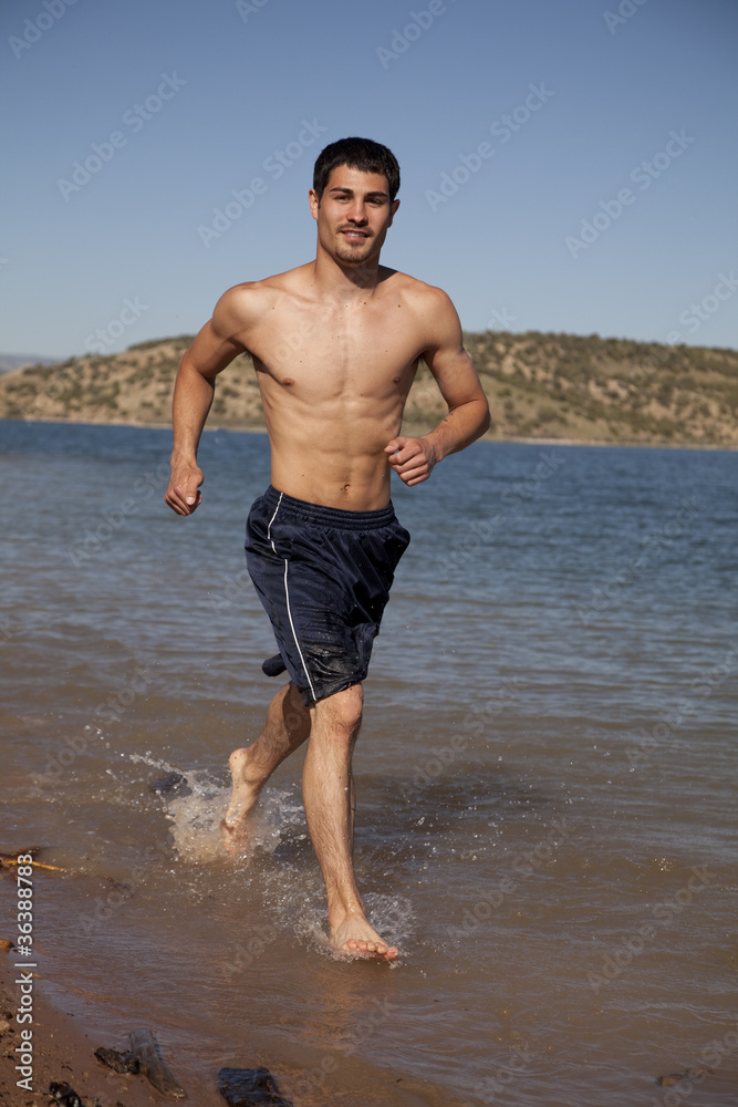 man run in water