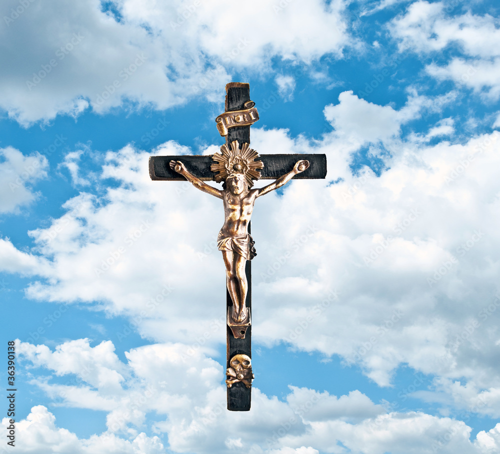 Jesus Christ on the cross with clouds