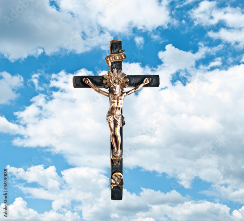 Jesus Christ on the cross with clouds