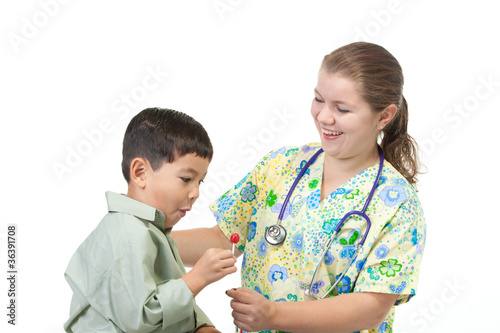 Quadro su tela Nurse gives boy candy.