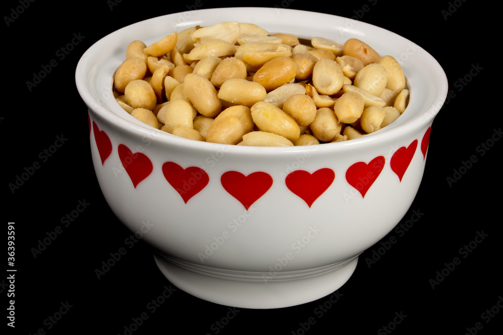 Peanuts in a heart bowl Peanuts in a heart bowl