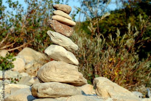 Photography zen stones close to river, concept of balance