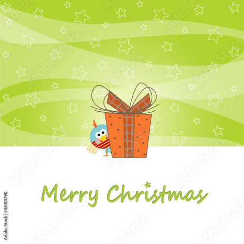 auguri di natale con regalo e uccellino