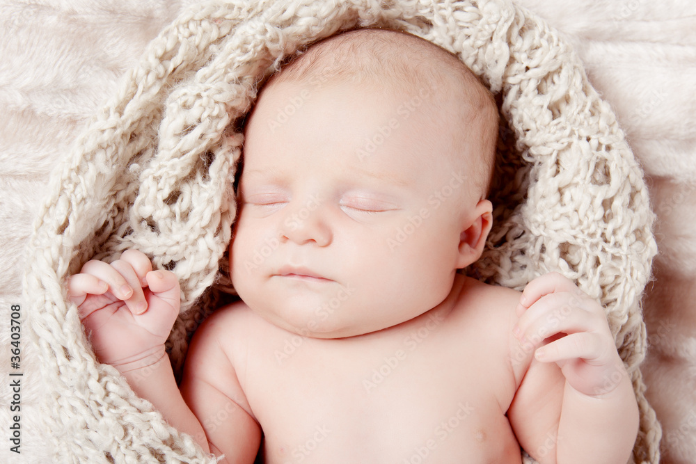 Picture of a newborn baby sleeping on a blanket Picture of a newborn baby sleeping on a blanket