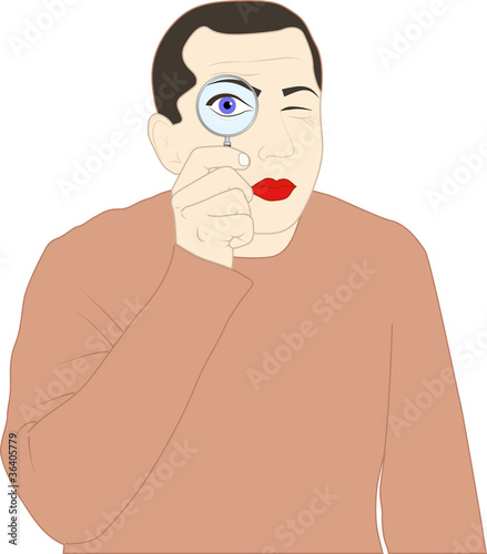 man looking through a magnifying glass