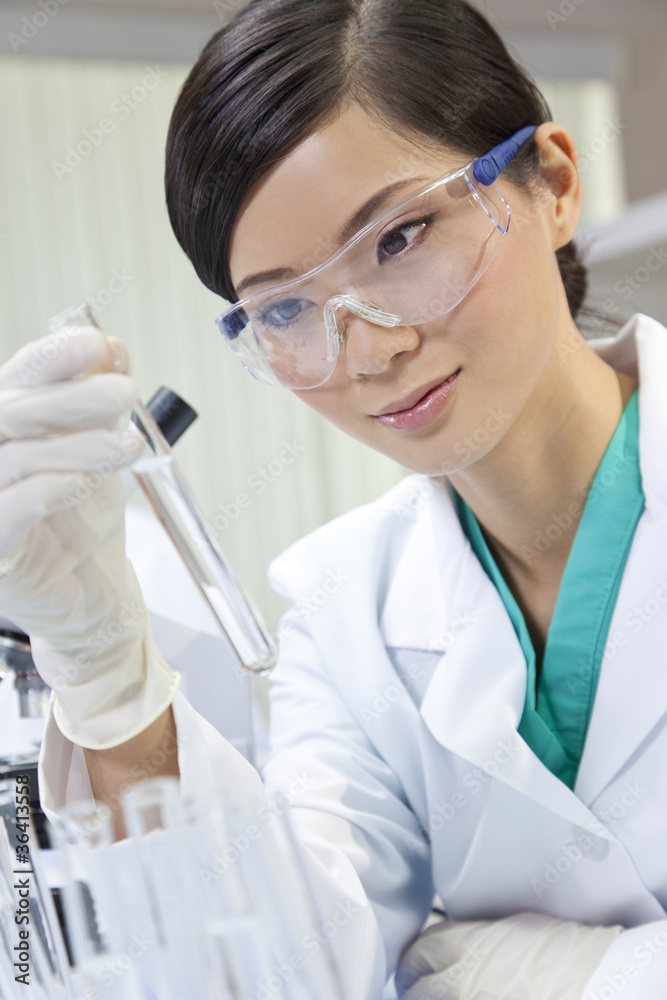 Chinese Female Woman Scientist With Test Tube In Laboratory Chinese Female Woman Scientist With Test Tube In Laboratory