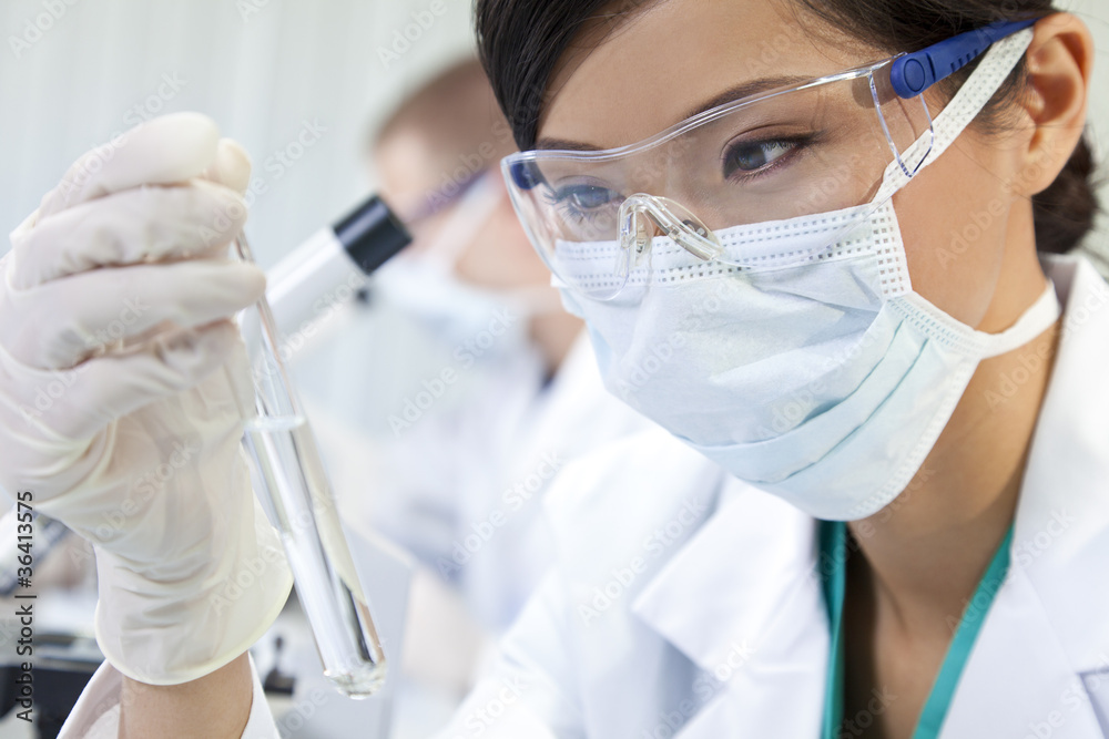 Chinese Female Woman Scientist With Test Tube In Laboratory Chinese Female Woman Scientist With Test Tube In Laboratory