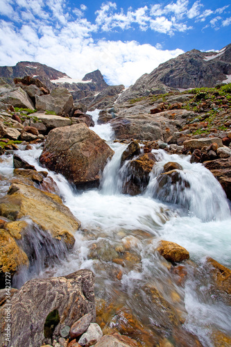 Waterfall in Caucasus mountains