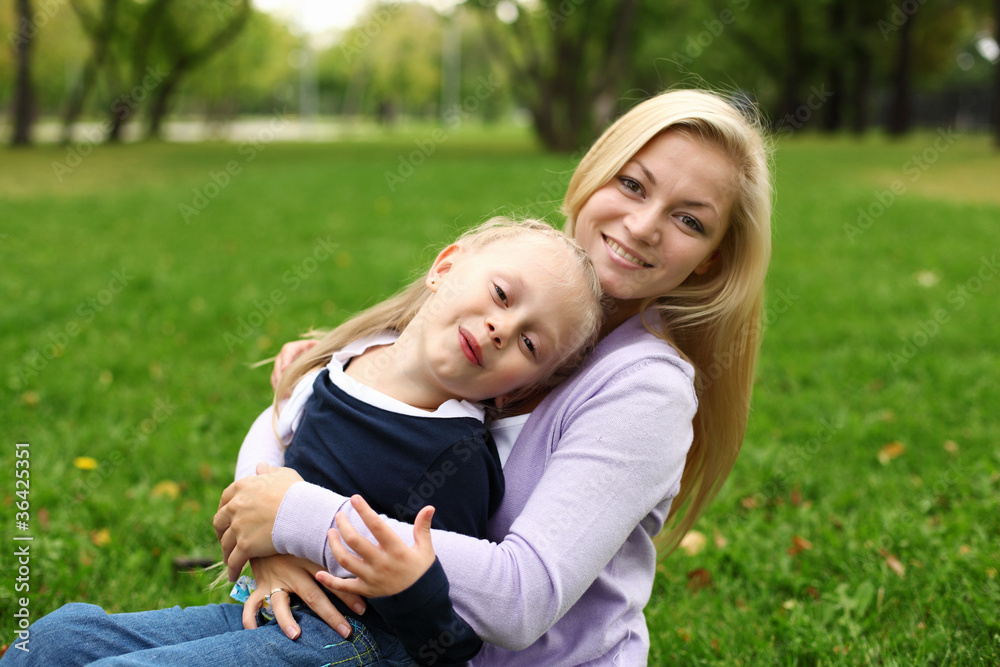 Fototapeta premium Mother and daughter in park