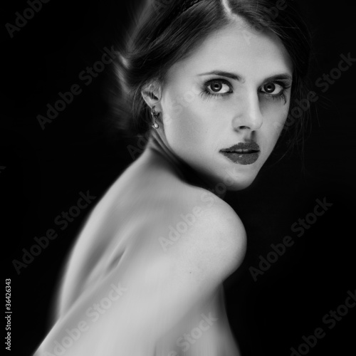 black and white portrait of attractive young woman