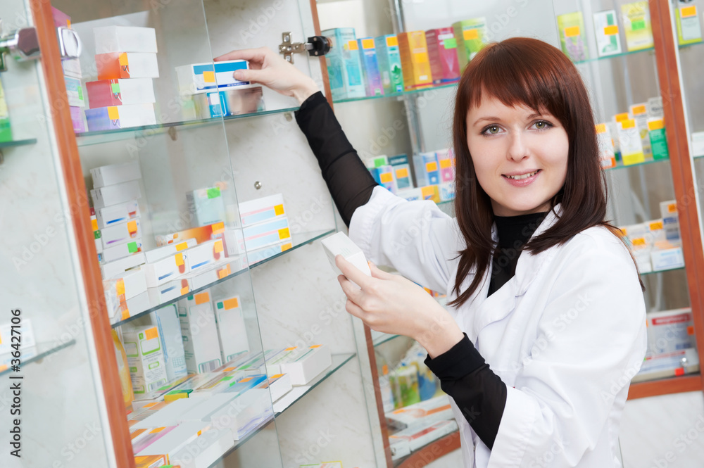 Pharmacy chemist woman in drugstore Pharmacy chemist woman in drugstore