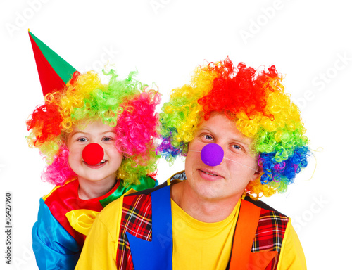 Clowns in colorful wigs