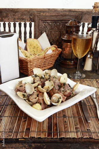 Traditional Portuguese pork & clams or Porco a Alentejana photo