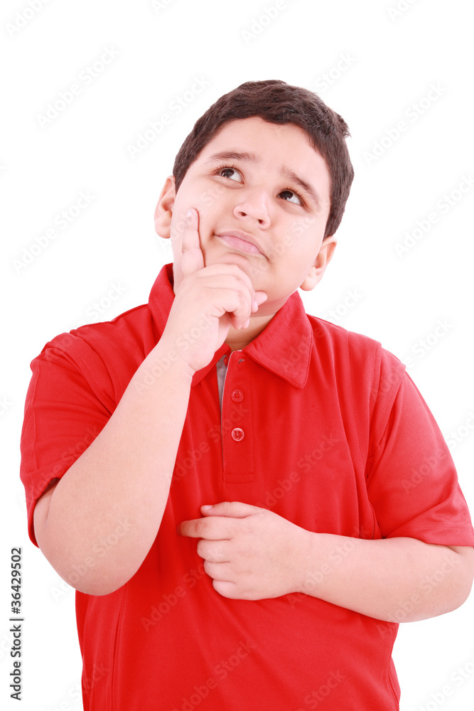 Child with a pensive expression looking up. Isolated on white ba Child with a pensive expression looking up. Isolated on white ba