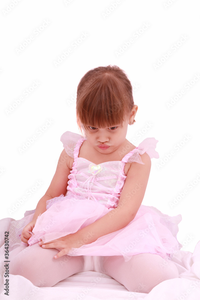 Full length portrait of a sad little ballerina dressed in pink Full length portrait of a sad little ballerina dressed in pink