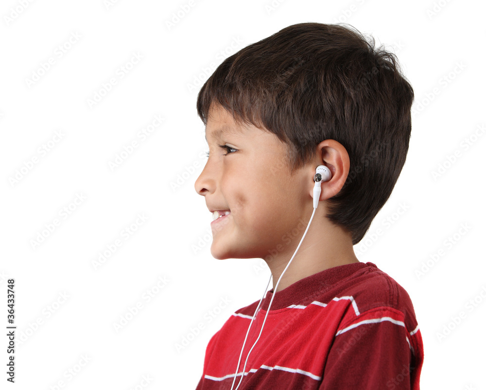 Profile of happy young boy with headphones Profile of happy young boy with headphones