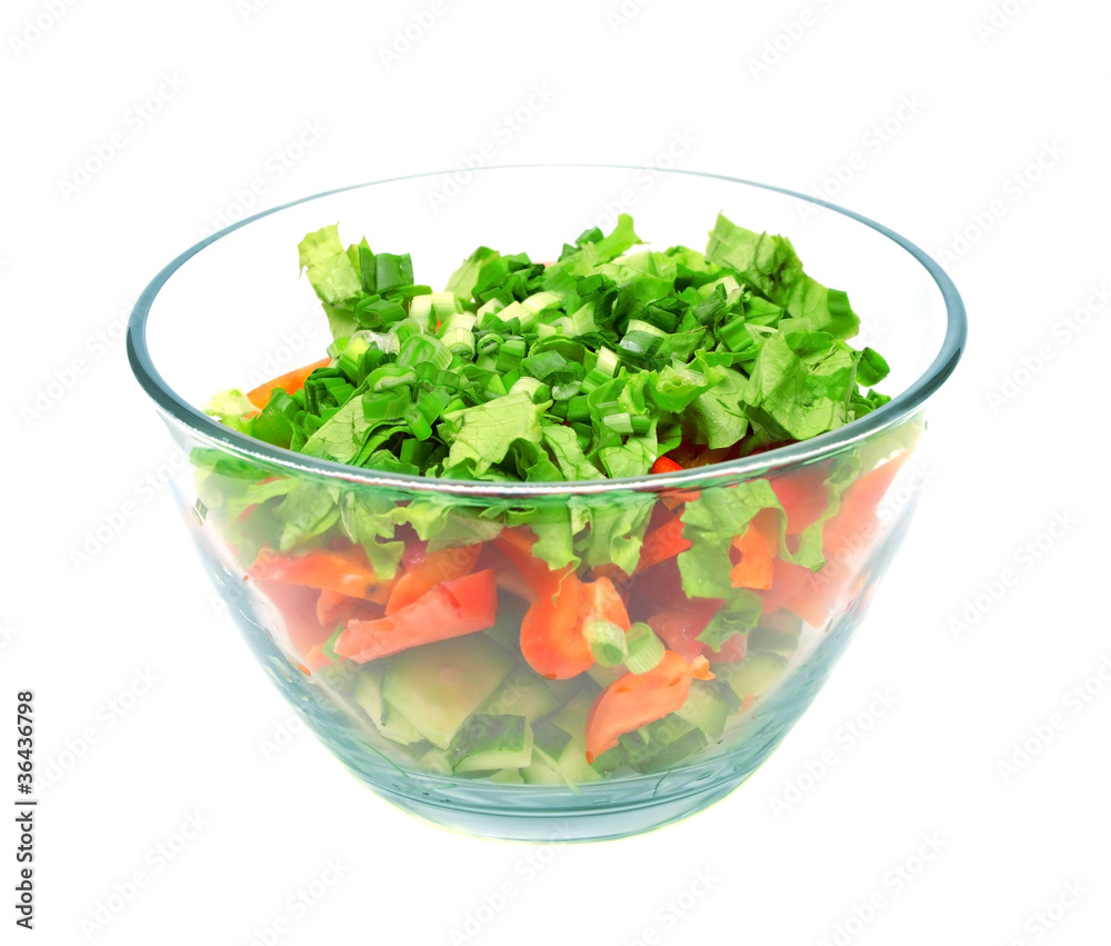 A bowl of salad with fresh lettuce, cucumber and tomato A bowl of salad with fresh lettuce, cucumber and tomato